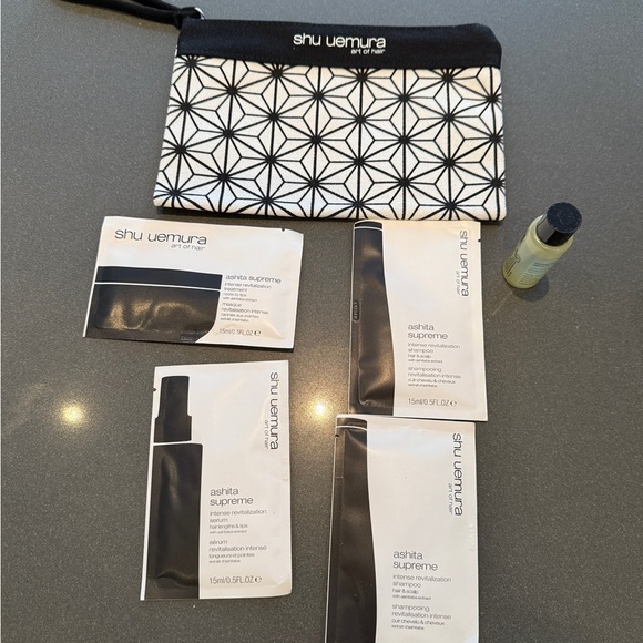 Shu Uemura Cosmetic Case w/ Essence Absolue Hair Oil and Ashita Supreme samples - Picture 1 of 2